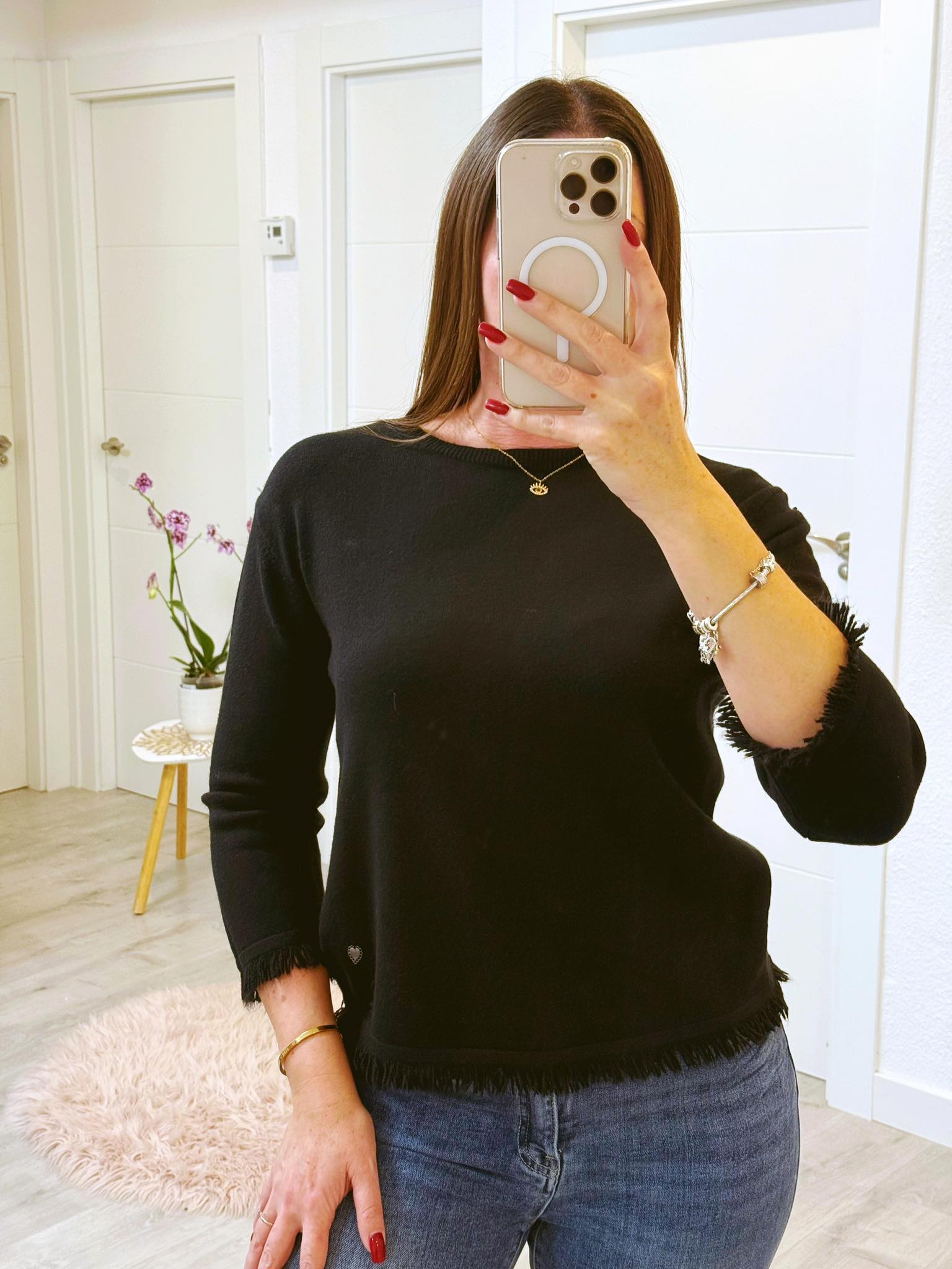 SUÉTER FLEQUITOS NEGRO