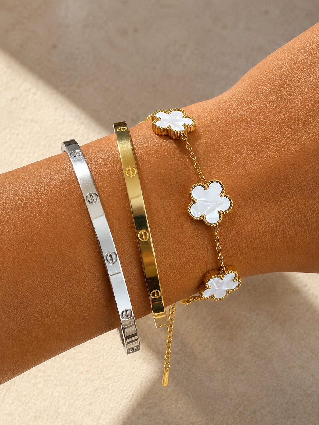 PULSERA FLORES BLANCAS ORO - ACERO